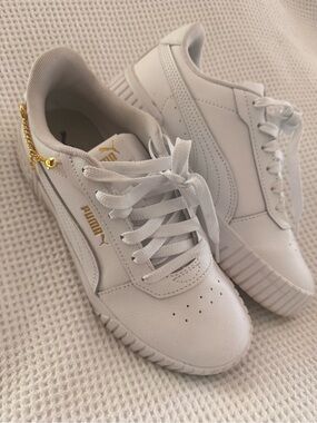 Puma White Women's Platform Sneakers with Gold Branding